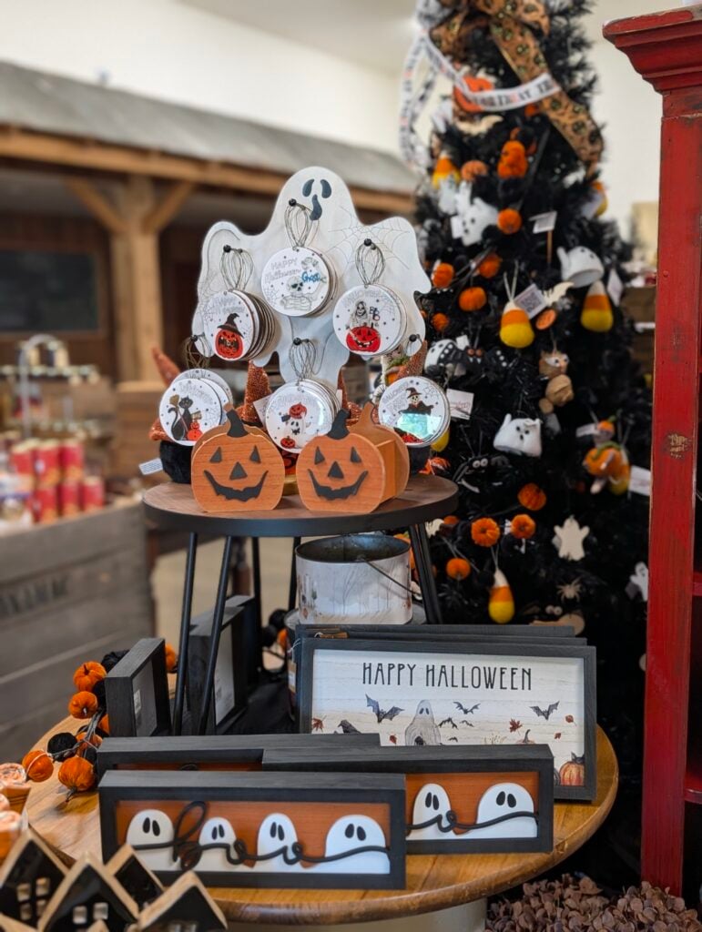 Halloween decorations with pumpkins and ghosts display